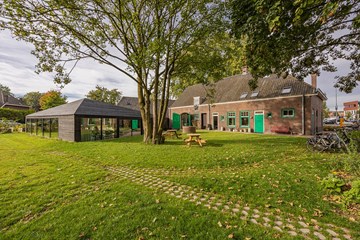 Architectenbureau en woonhuis in oude boerderij