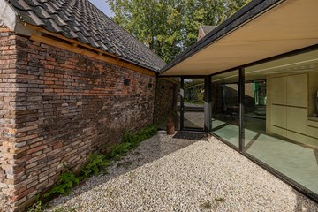 Architectenbureau en woonhuis in oude boerderij